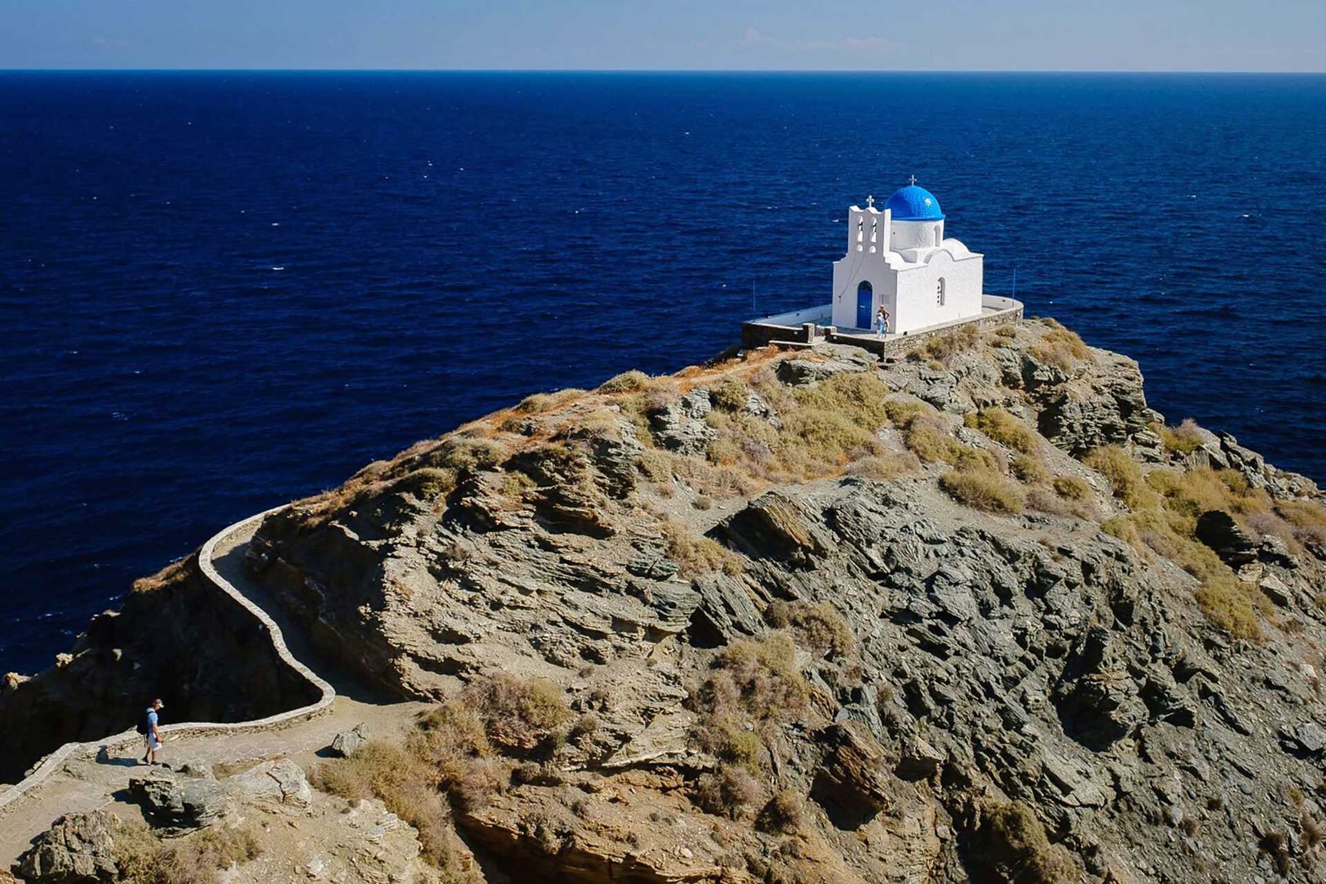 small white church on cliffside