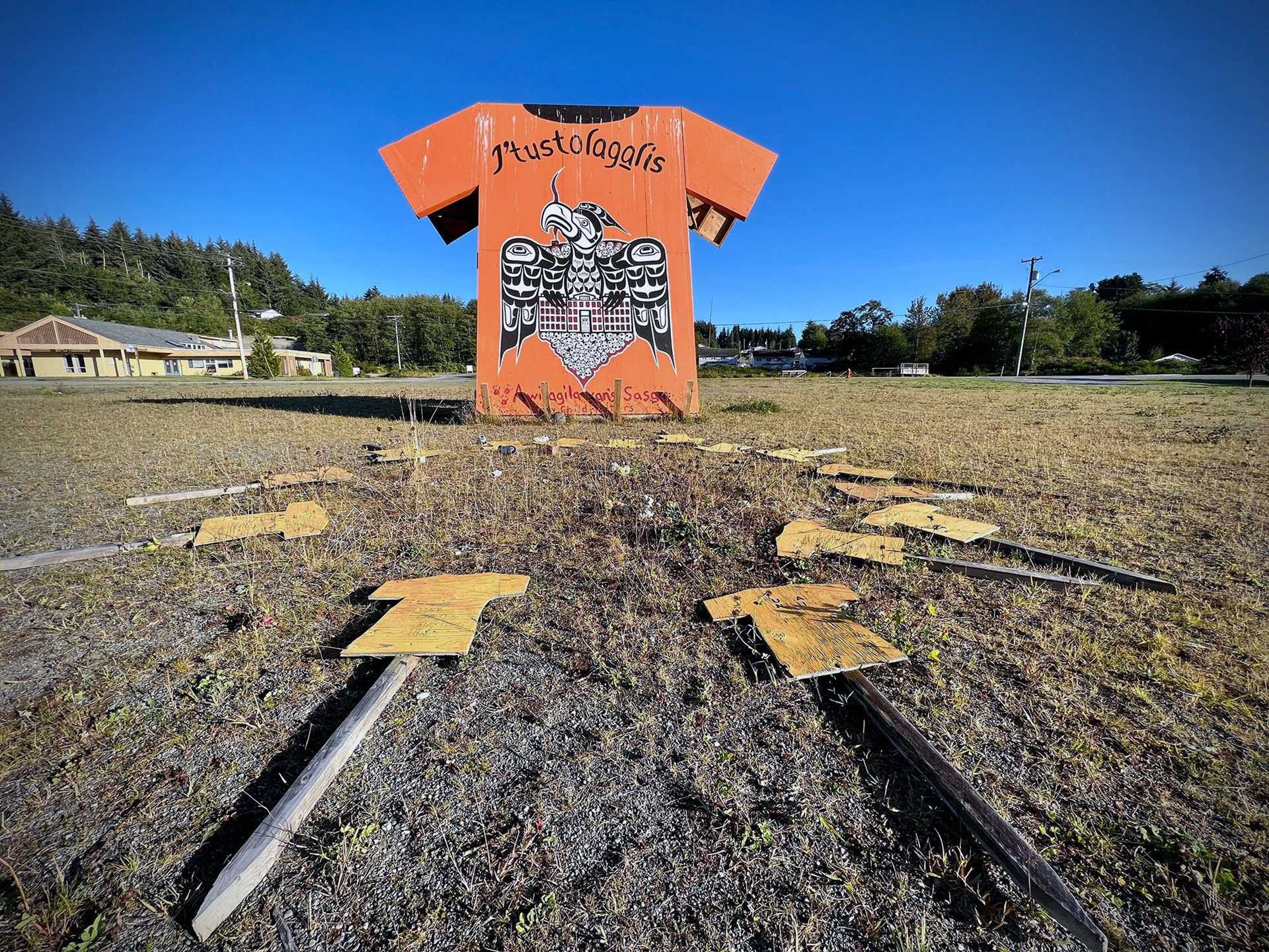 orange sign shaped like a t-shirt